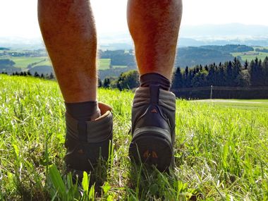 Hiking boots on a meadow