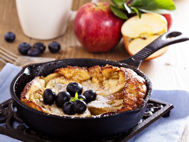 Small pan with breakfast casserole, blueberries