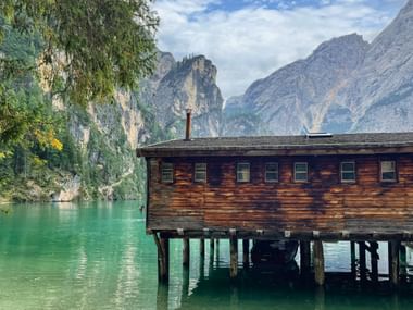 Fishing hut on Lake Braies with the mountains in the background