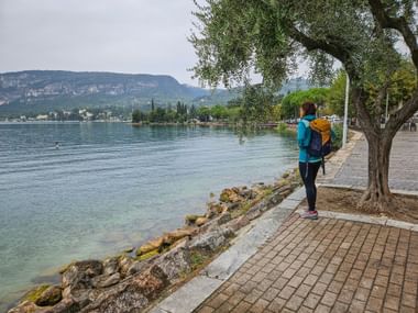 Hiker enjoys the view of Lake Garda