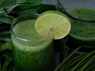 Green juice, glass, slice of lime