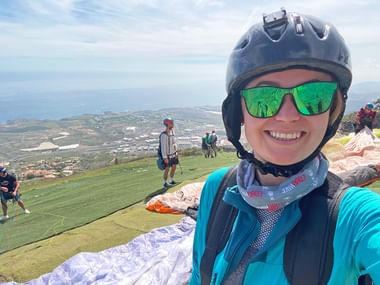 Employee Julia paragliding on Tenerife