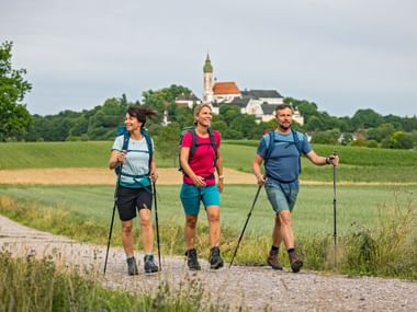 Hikers on the King Ludwig Trail near Andechs Monastery Hikers on the King Ludwig Trail near Andechs Monastery