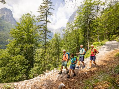 Hikers explore the impressive Brenta Dolomites