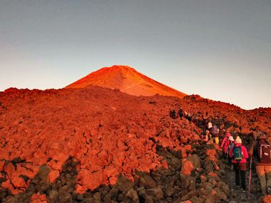 Hiking group at sunrise on the Teide