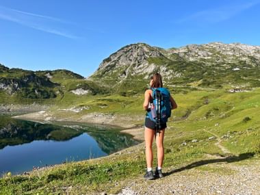 Hiker with a view of Lake Formarin