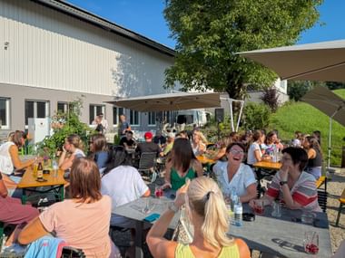 Summer party 2025 Employees sitting comfortably together
