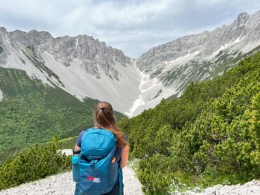 Hiker with a mountain view in the Karwendel mountains