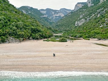 Sabrina at deserted beach at Cala Sisine