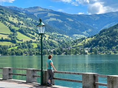 Hiker enjoys the view of Lake Zell Hiker enjoys the view of Lake Zell