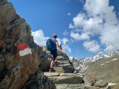 Hiker on rocks in the Schnalstal Valley