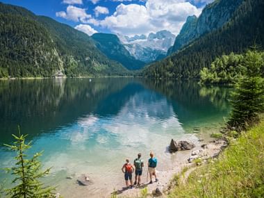Hiking break at Lake Gosau with a view of the Dachstein Hiking break at Lake Gosau with a view of the Dachstein