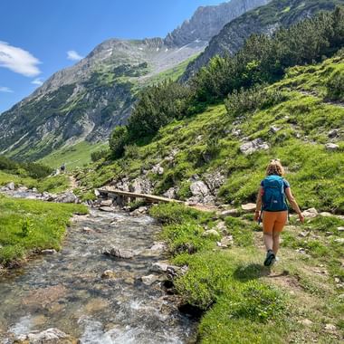 Hiker on the way from Lake Formarin to Lech