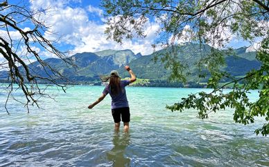 Hiker in the Wolfgangsee near Gschwendt