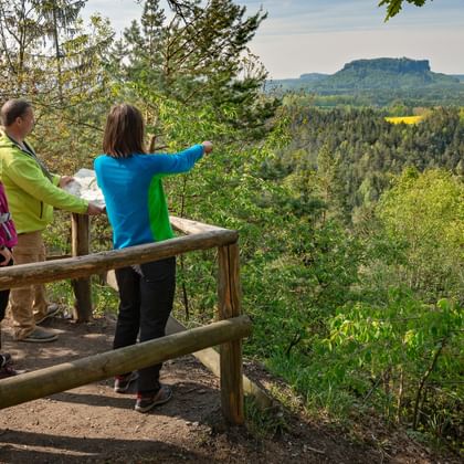 Hikers enjoy the view of Lilienstein