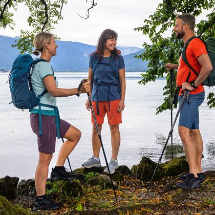 Hikers on the shore of Lake Tegernsee