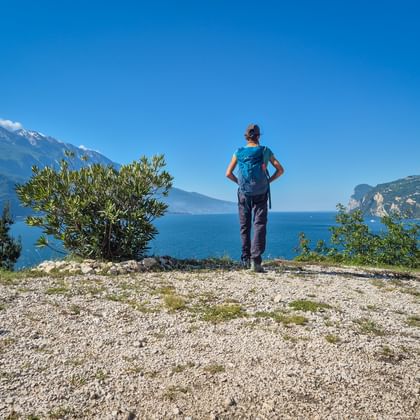Hiker at Punta Larici on Lake Garda