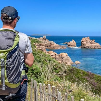 Hikers with a view of the coast in Brittany
