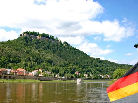 Boat trip at the Elbe with view to the Koenigstein