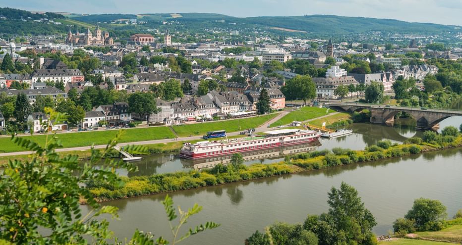 View of Trier with Moselle and ship in the foreground