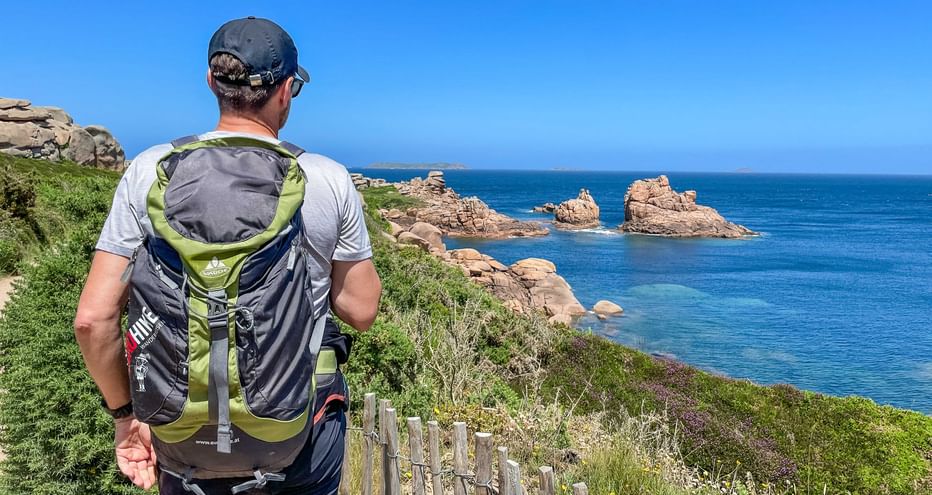 Hikers with a view of the coast in Brittany