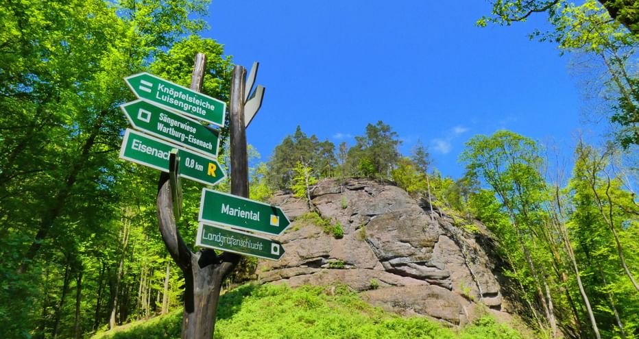 Entrance to Dragon Gorge with signposts in the foreground